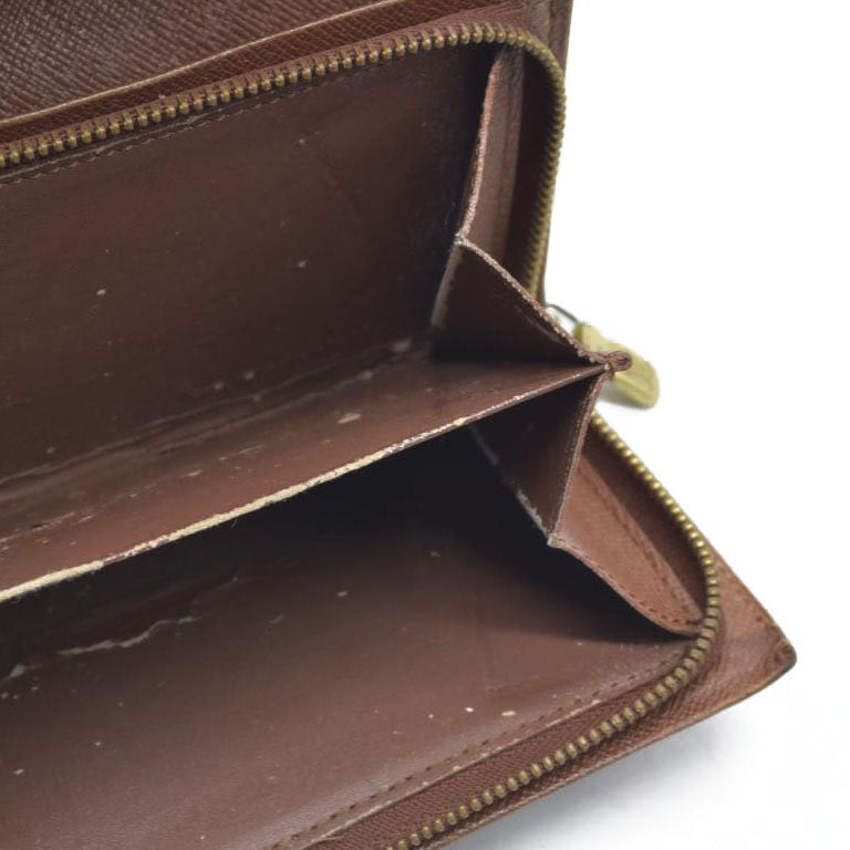 $560 Louis Vuitton  Monogram Porte-Monnaie Tresor Wallet