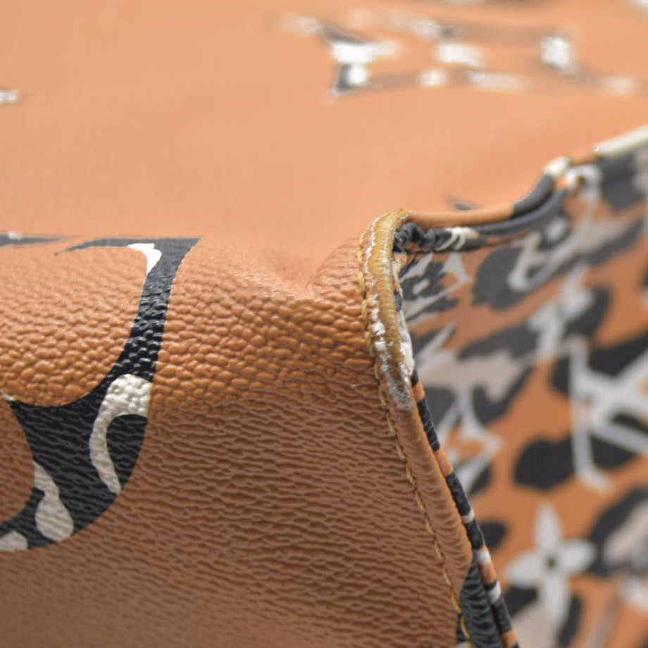 Louis Vuitton  Monogram Giant Jungle Onthego GM Ivory