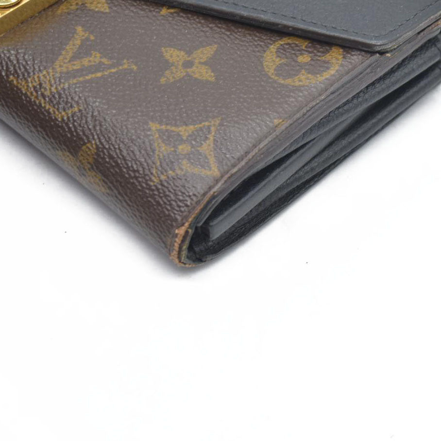 $1140 Louis Vuitton  Monogram Pallas Wallet Black