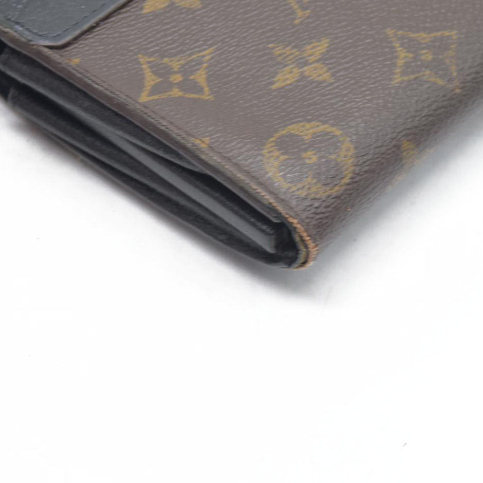 $1140 Louis Vuitton  Monogram Pallas Wallet Black