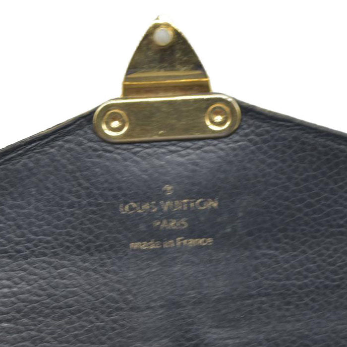 $1140 Louis Vuitton  Monogram Pallas Wallet Black