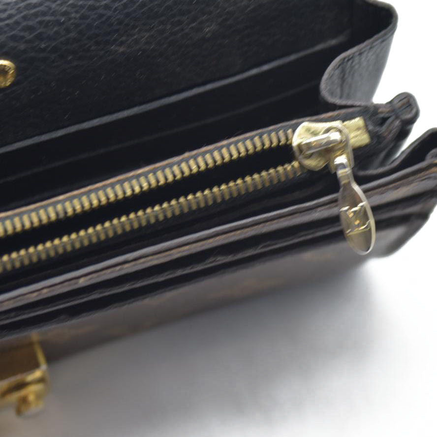 $1140 Louis Vuitton  Monogram Pallas Wallet Black