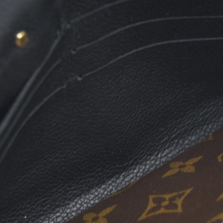 $1140 Louis Vuitton  Monogram Pallas Wallet Black