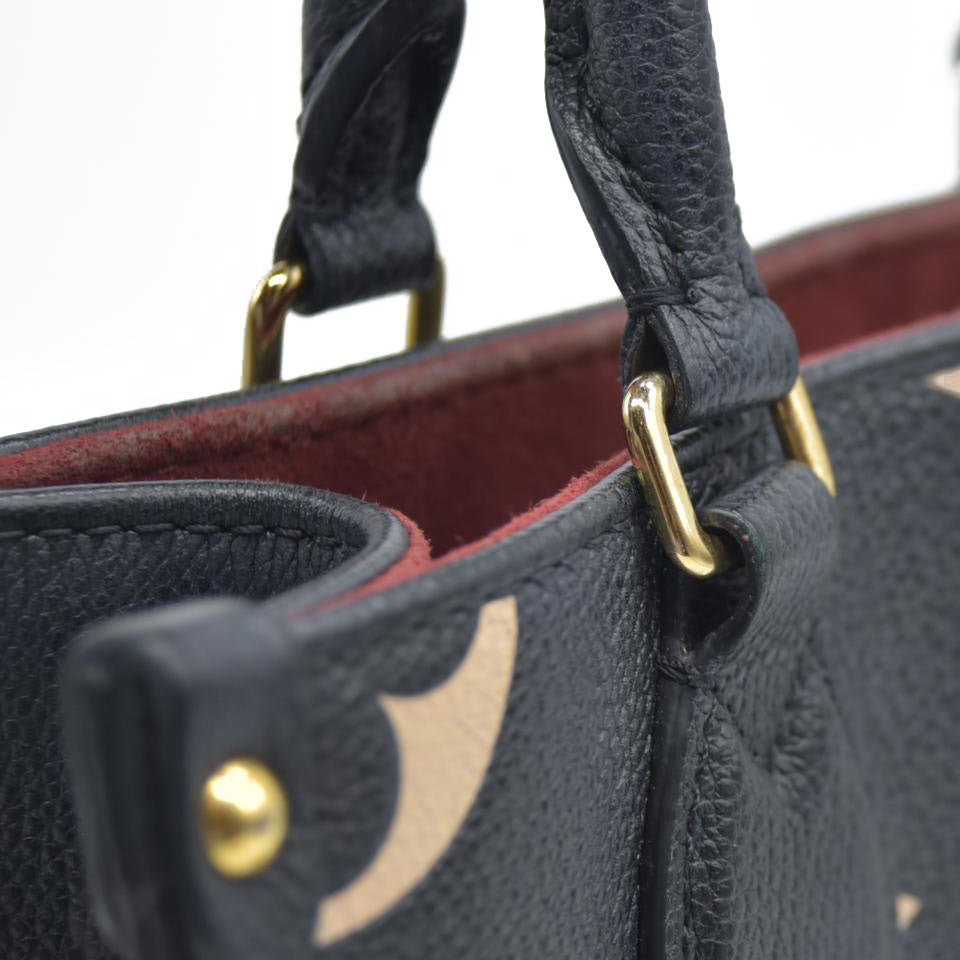 AUCTION $3550 Louis Vuitton Bicolor Monogram Empreinte Leather Onthego PM RFID