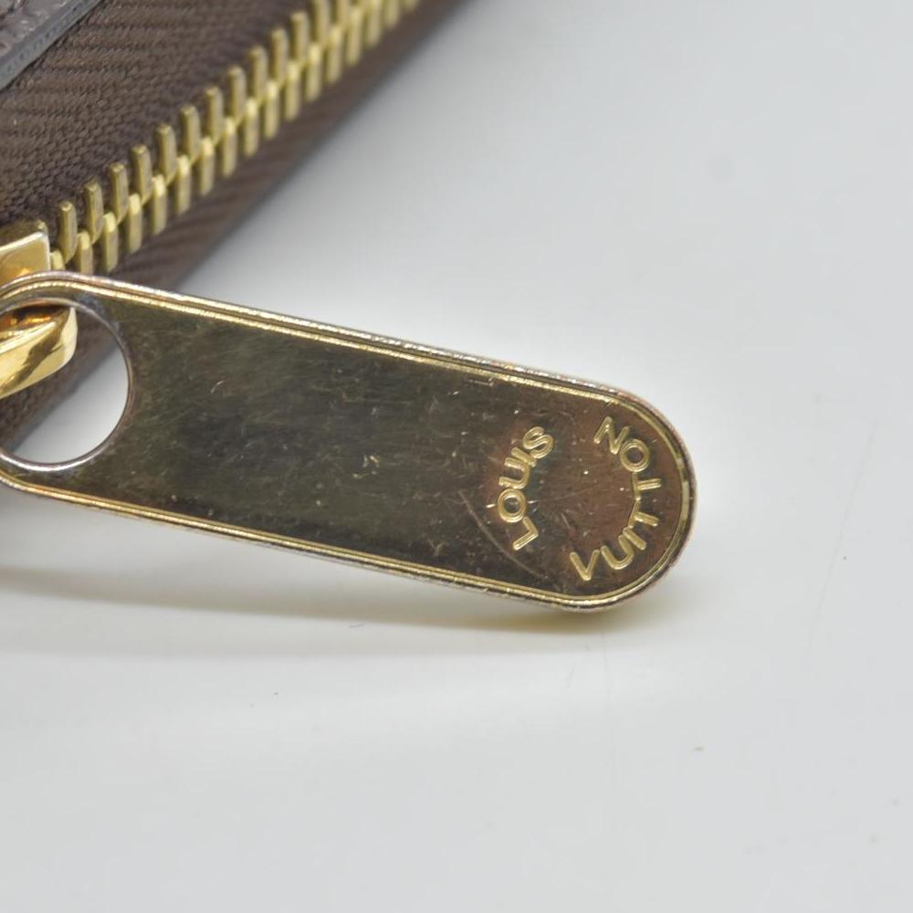 $915 2019 LOUIS VUITTON Monogram Love Lock Zippy Wallet CONSIGNMENT MI0159
