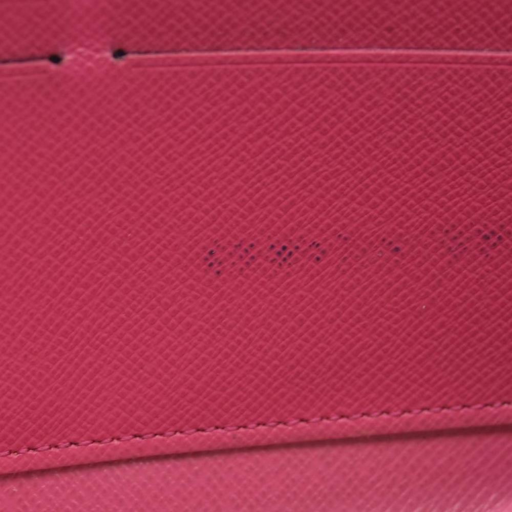 $915 2019 LOUIS VUITTON Monogram Love Lock Zippy Wallet CONSIGNMENT MI0159