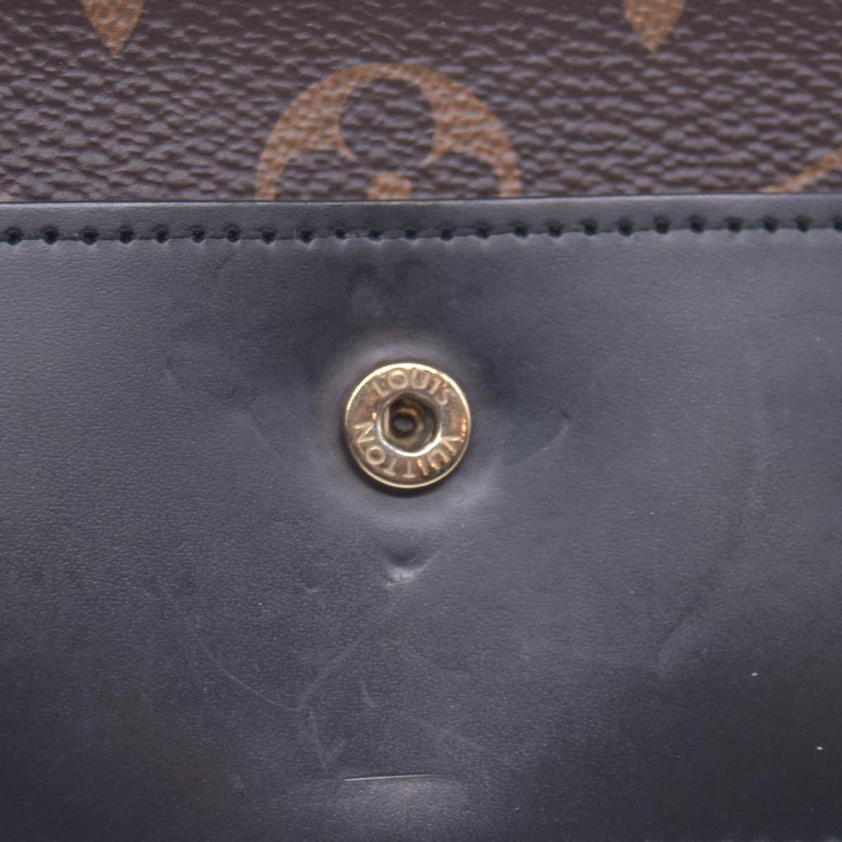 2012 Louis Vuitton Monogram Flower Lock Compact Wallet Black SP4182 CONSIGNMENT