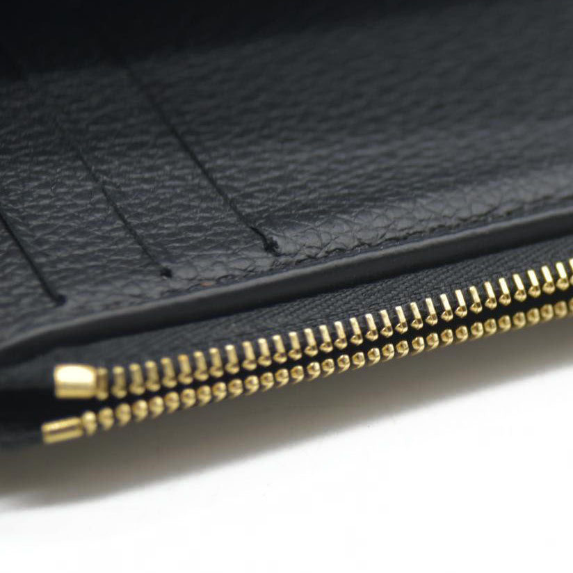 AUCTION $755 Louis Vuitton LV Monogram Empreinte Leather Victorine Wallet