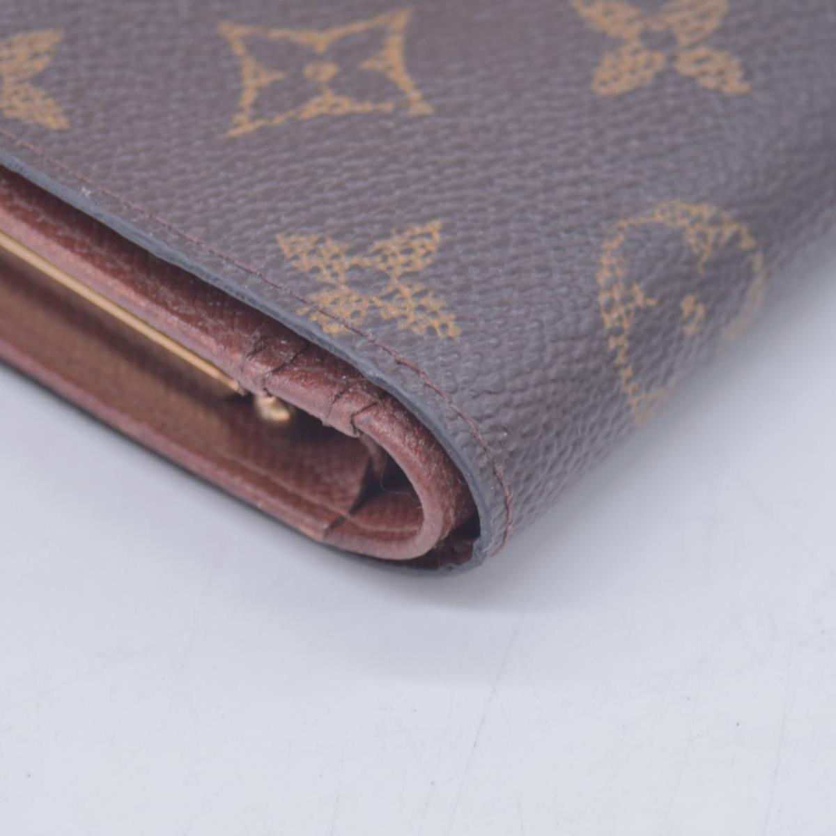 $735 2000 Louis Vuitton French Kiss Lock Monogram Wallet MI0080 CONSIGNMENT 10020917