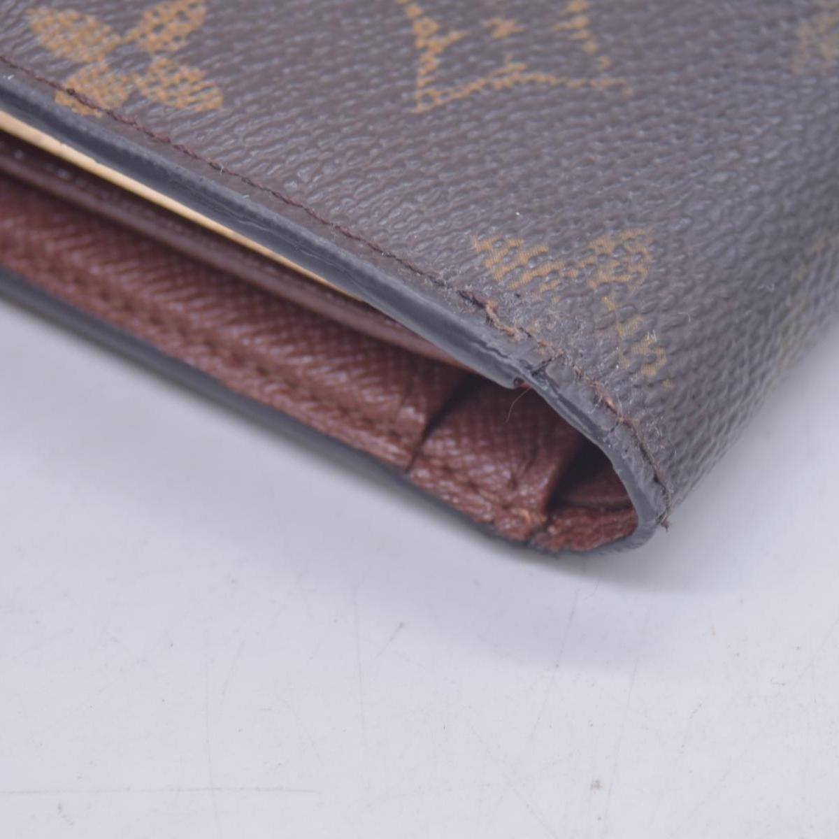 $735 2000 Louis Vuitton French Kiss Lock Monogram Wallet MI0080 CONSIGNMENT 10020917