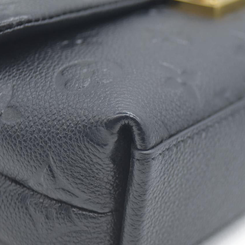 Louis Vuitton  Empreinte Monogram Nano Madeleine Black