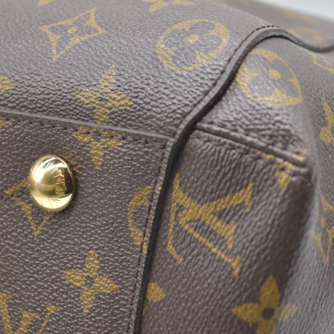 AUCTION $2640  LOUIS VUITTON  Monogram Montaigne GM TR1104