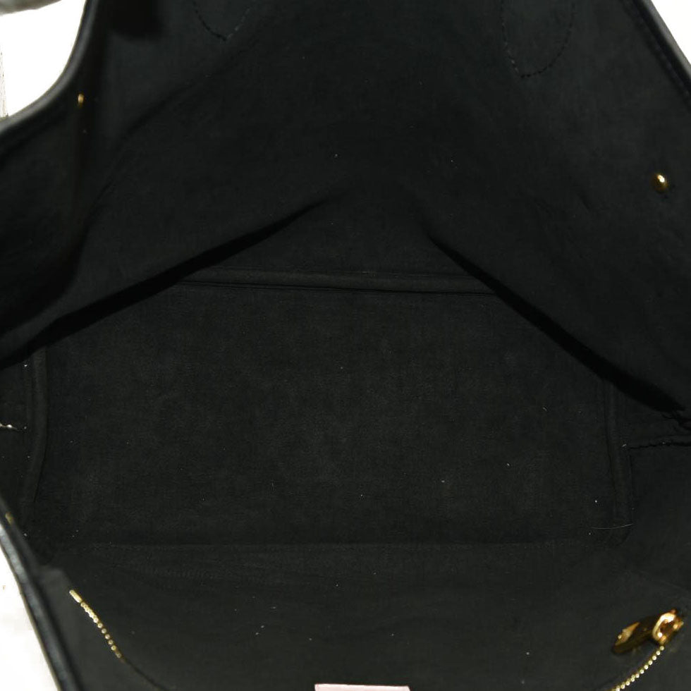 Louis Vuitton  Empreinte Monogram Giant Wild At Heart Neverfull MM Creme