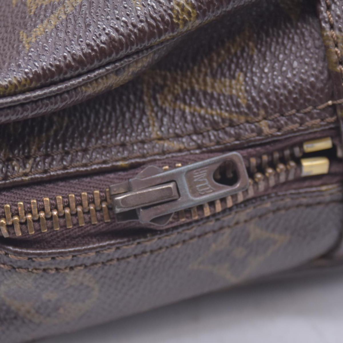 $600 Louis Vuitton Monogram Trousse Toilette 23 821