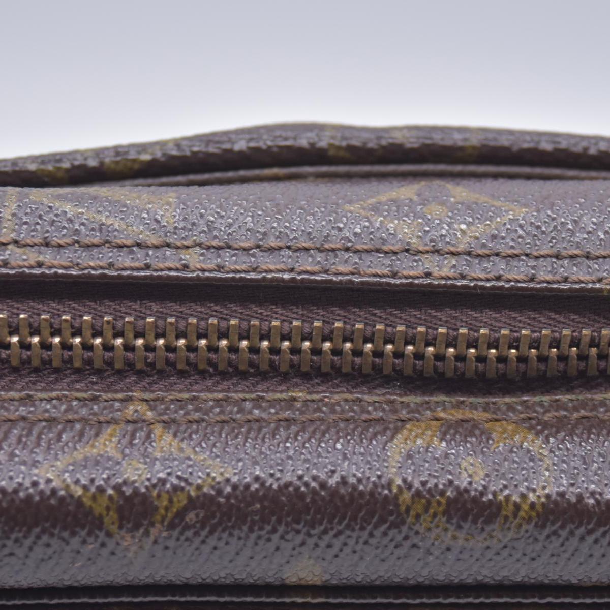 $600 Louis Vuitton Monogram Trousse Toilette 23 821