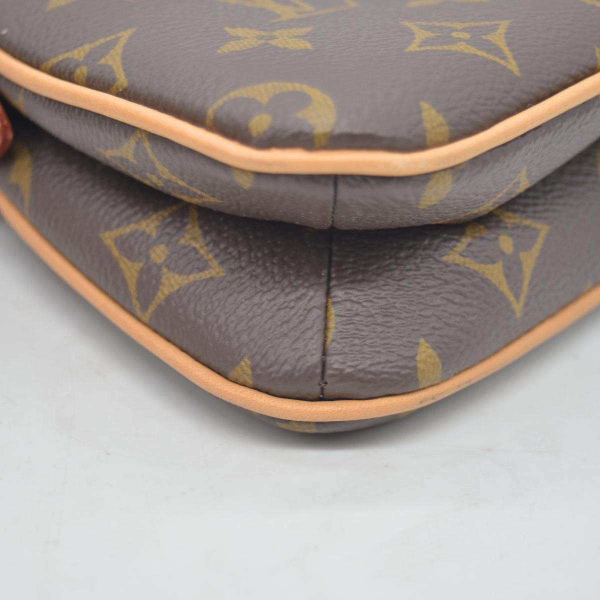 $1,950 LOUIS VUITTON Monogram Liv Pochette