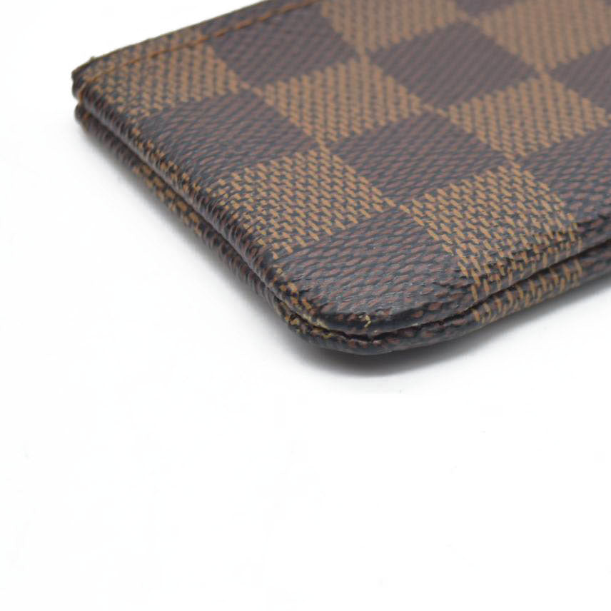AUCTION  $345 Louis Vuitton  Damier Ebene Key Pouch
