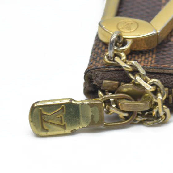 AUCTION  $345 Louis Vuitton  Damier Ebene Key Pouch