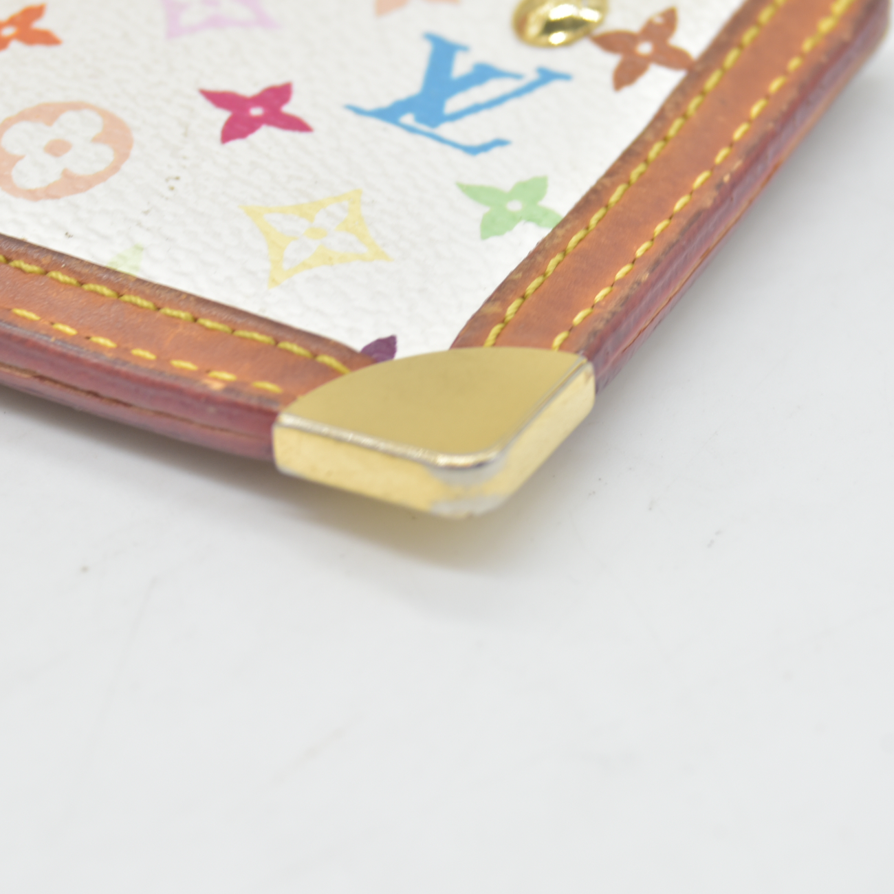 $450 2003 Louis Vuitton Monogram Multicolor Key Pouch White CA0063
