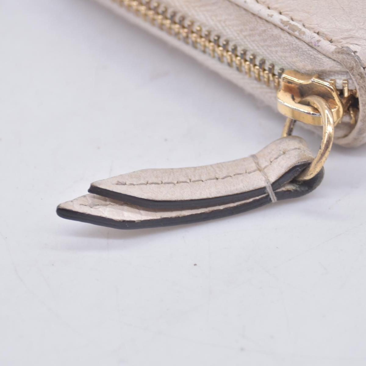 $660 2005 Gucci Cream GG Marmont zip around wallet 10021060