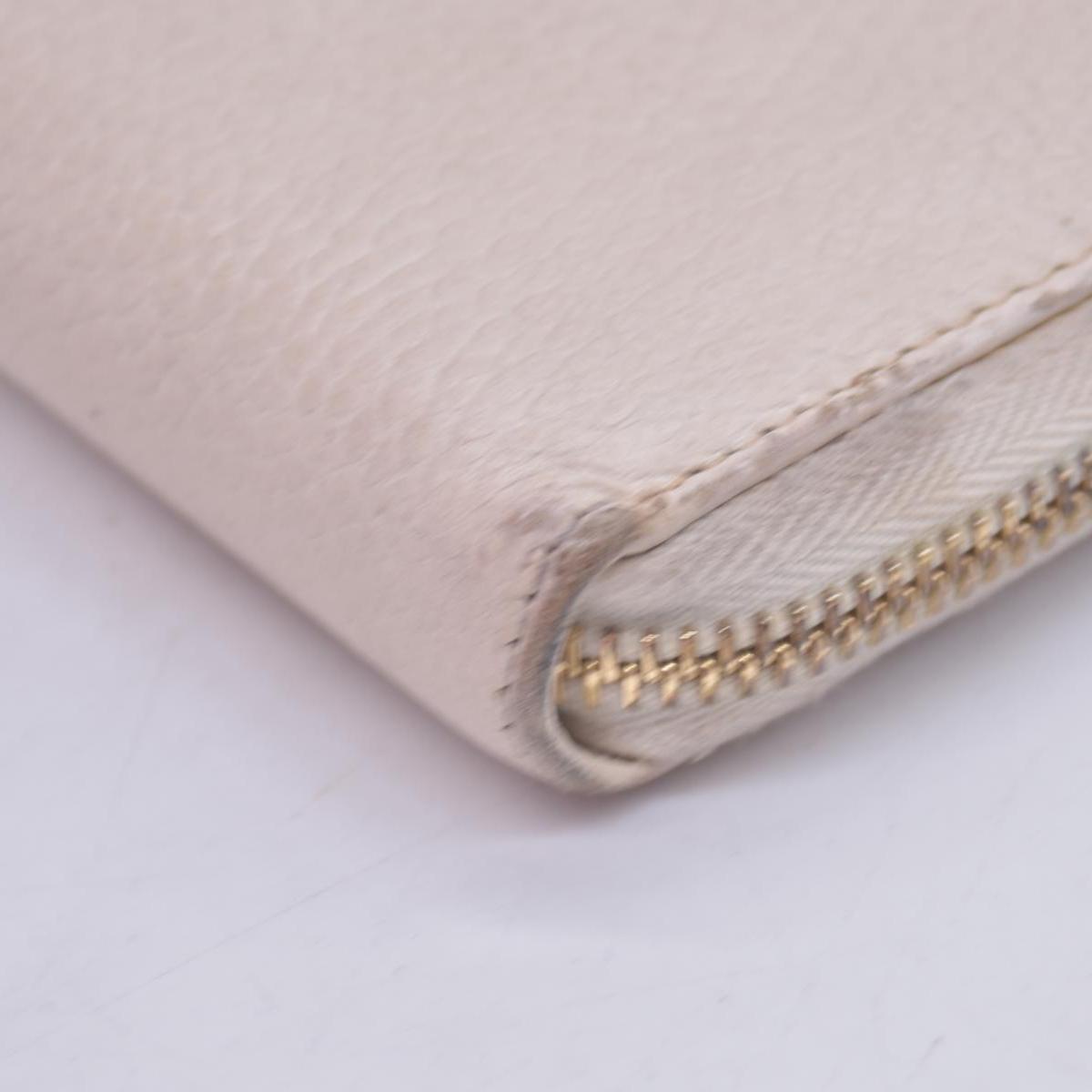 $660 2005 Gucci Cream GG Marmont zip around wallet 10021060