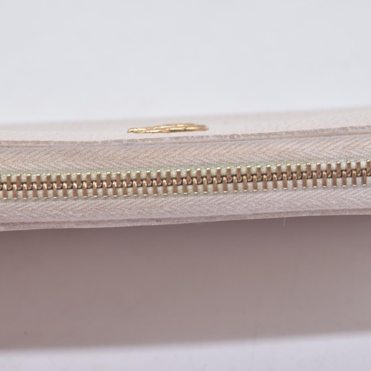 $660 2005 Gucci Cream GG Marmont zip around wallet 10021060