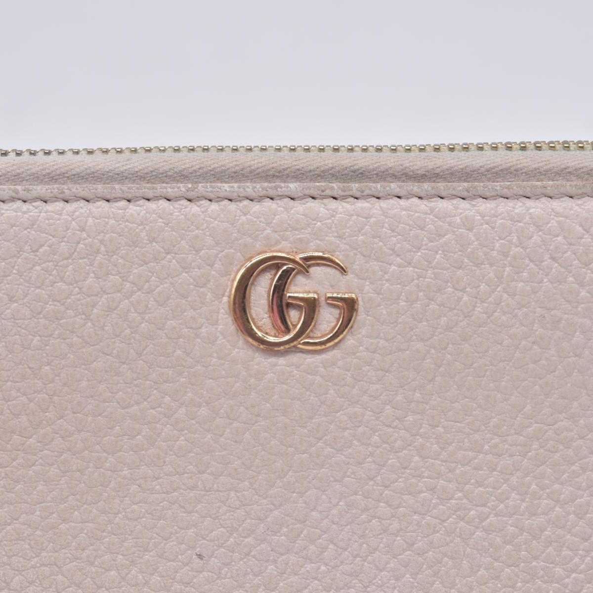 $660 2005 Gucci Cream GG Marmont zip around wallet 10021060