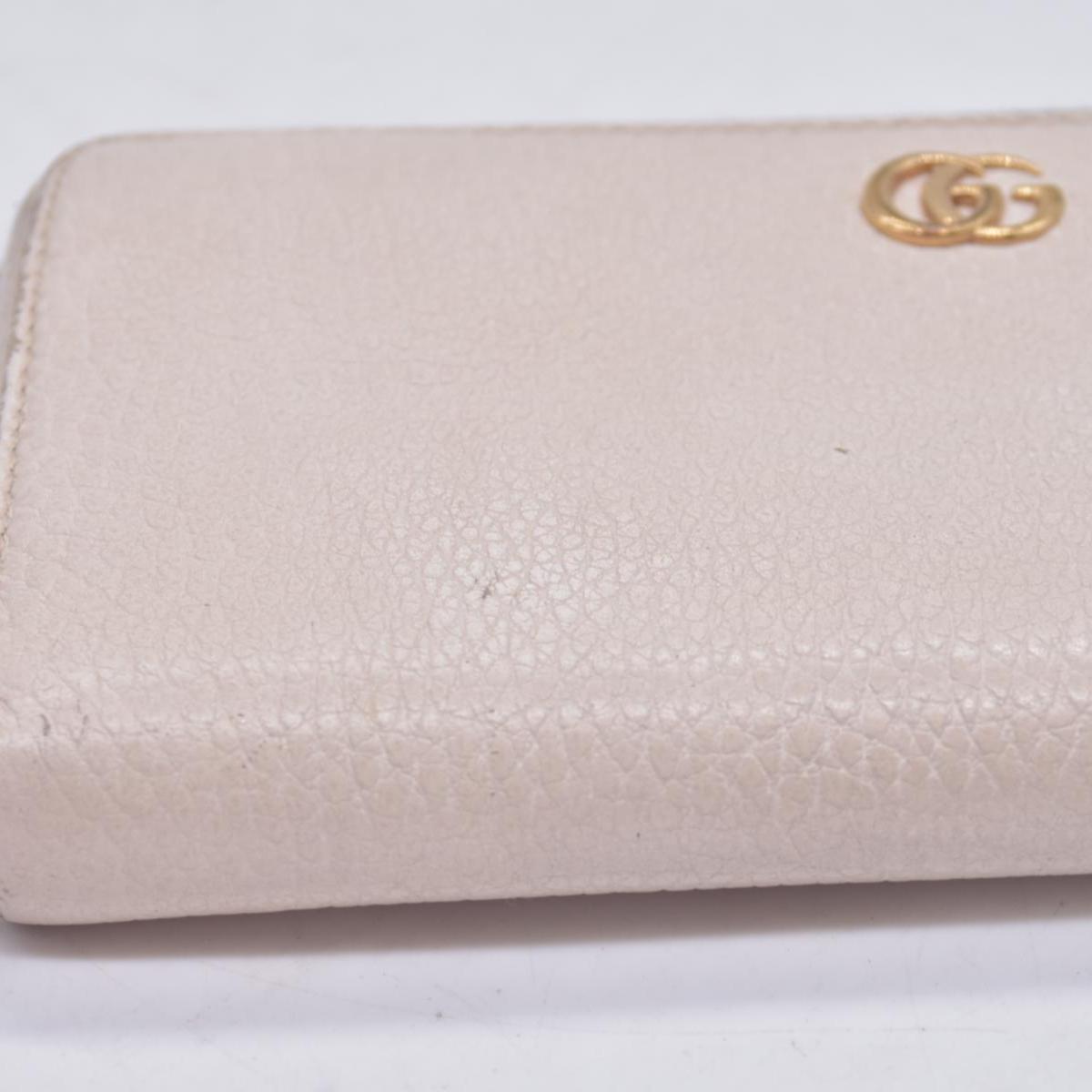 $660 2005 Gucci Cream GG Marmont zip around wallet 10021060