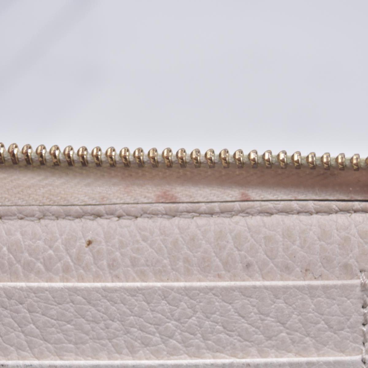 $660 2005 Gucci Cream GG Marmont zip around wallet 10021060