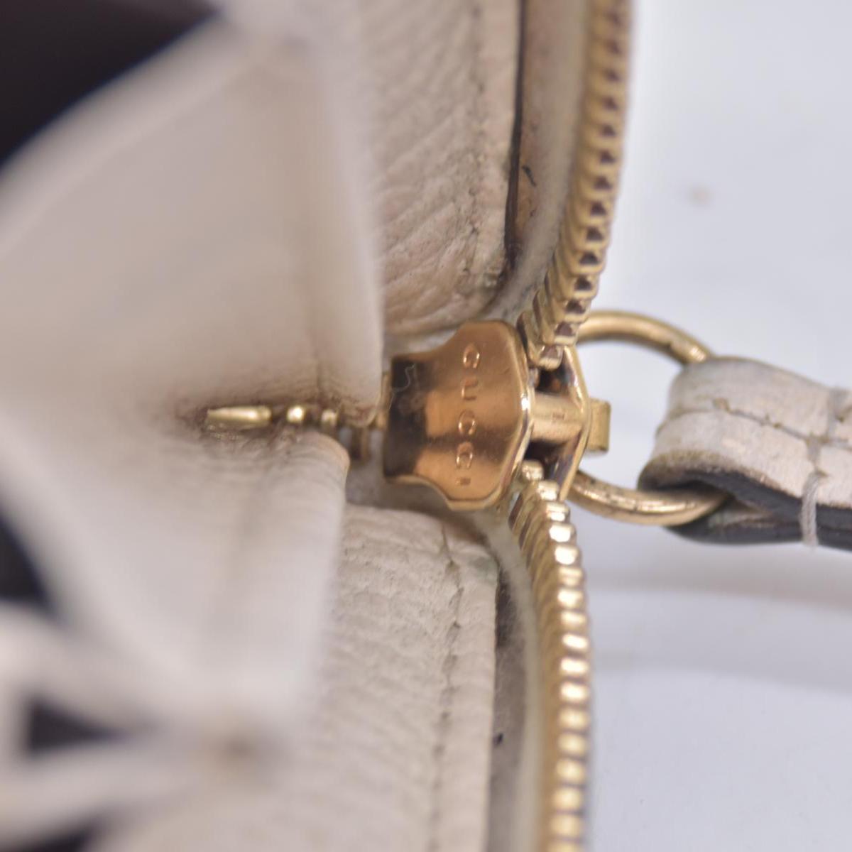 $660 2005 Gucci Cream GG Marmont zip around wallet 10021060