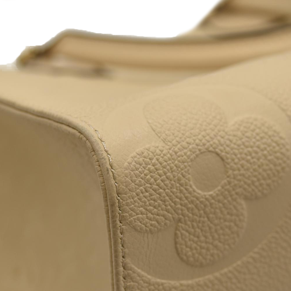 LOUIS VUITTON Empreinte Monogram Giant Onthego MM Creme