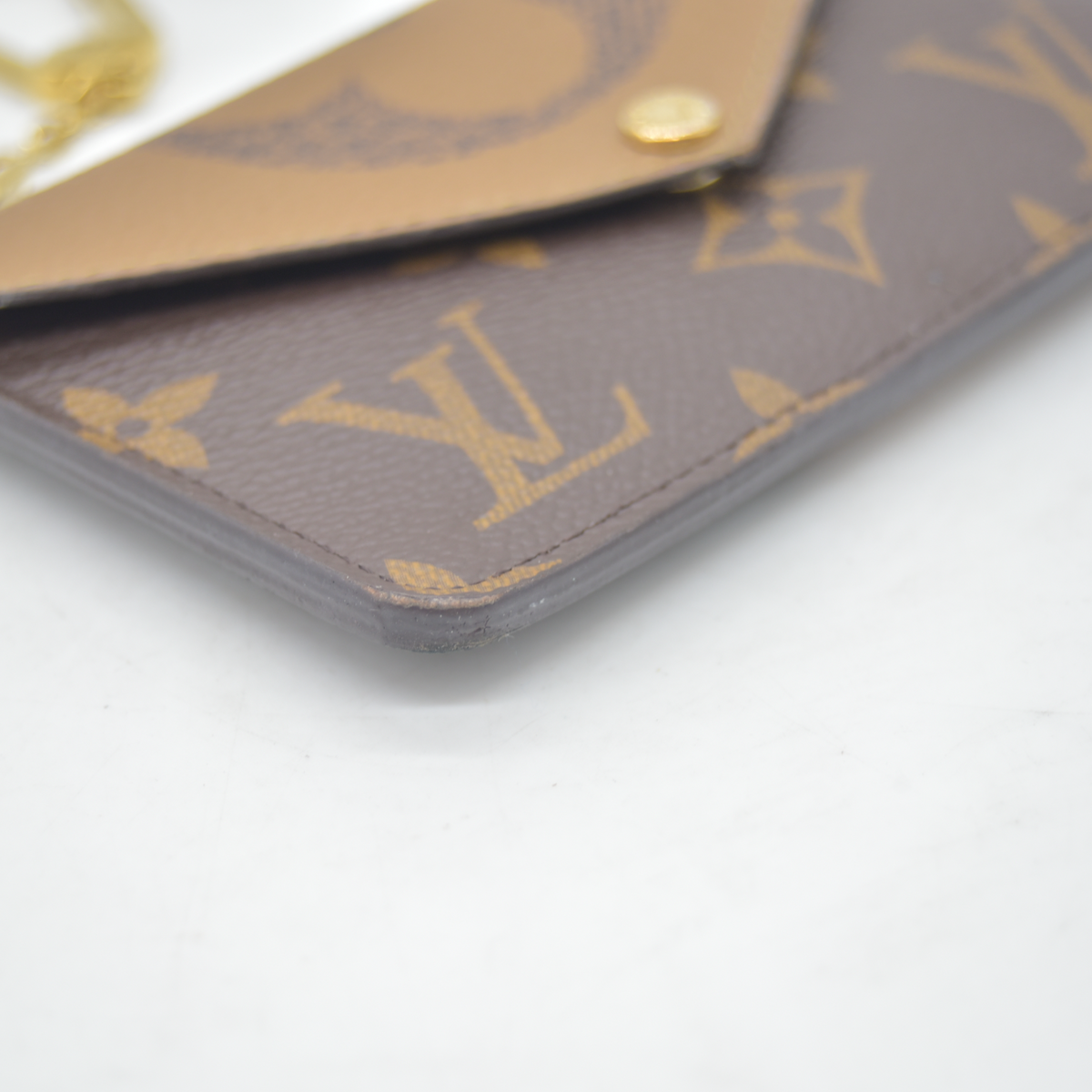 $700 RFID Louis Vuitton Reverse Monogram Recto Verso Card Holder Brown
