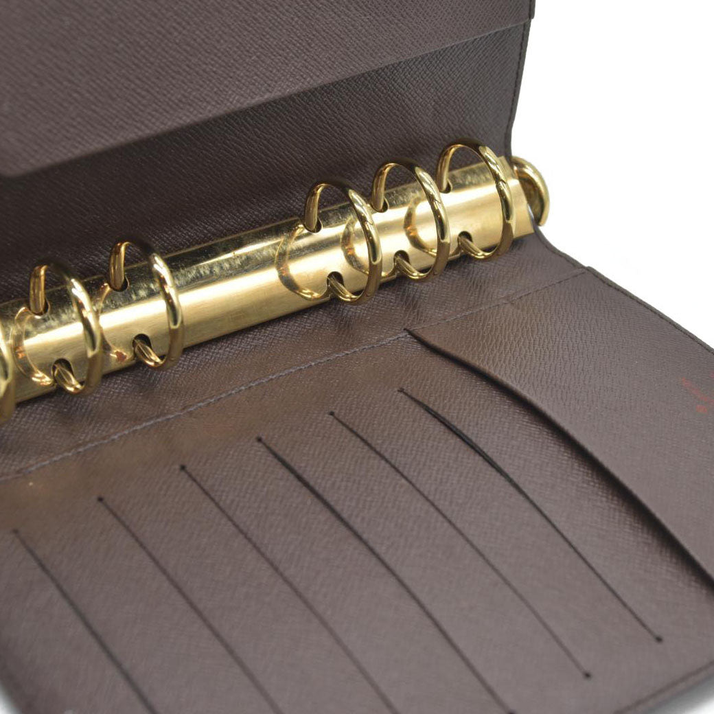 AUCTION  $675 Louis Vuitton  Damier Ebene Medium Ring Agenda SP0055