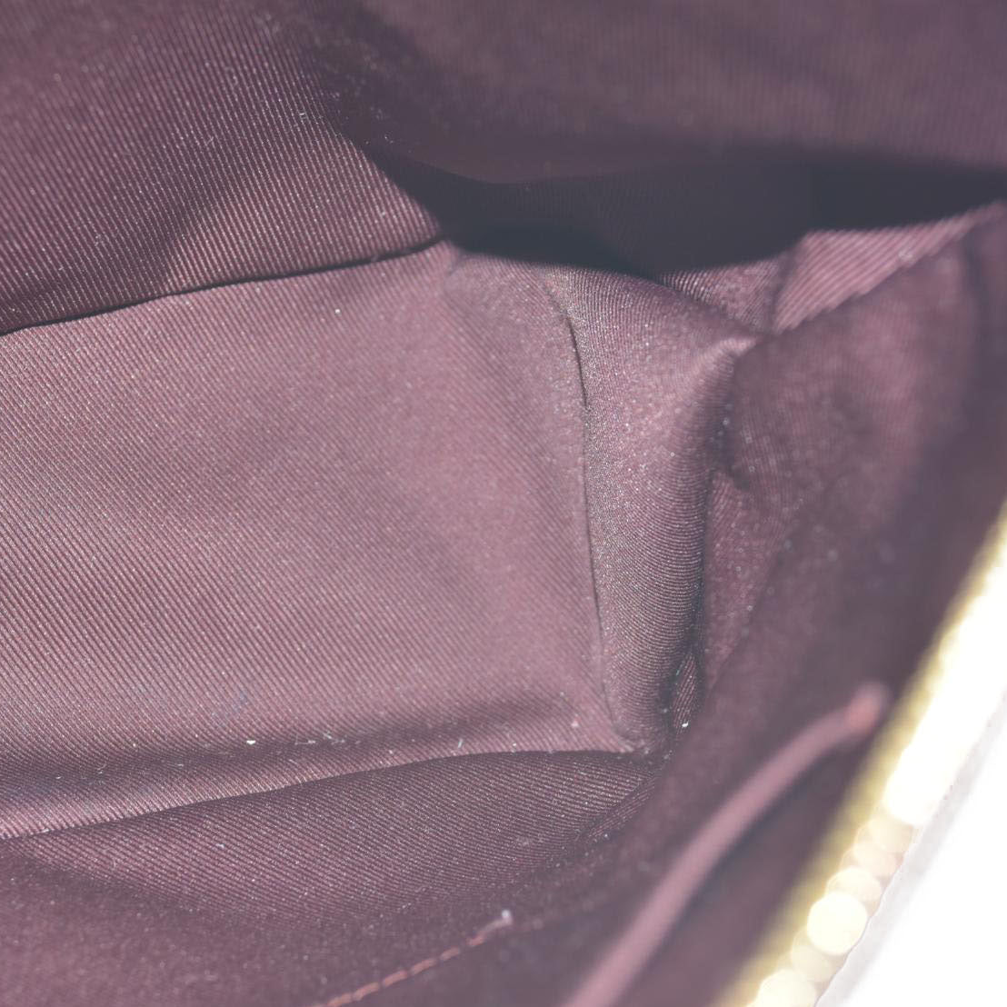 $2230  Louis Vuitton  Monogram Odeon MM Natural