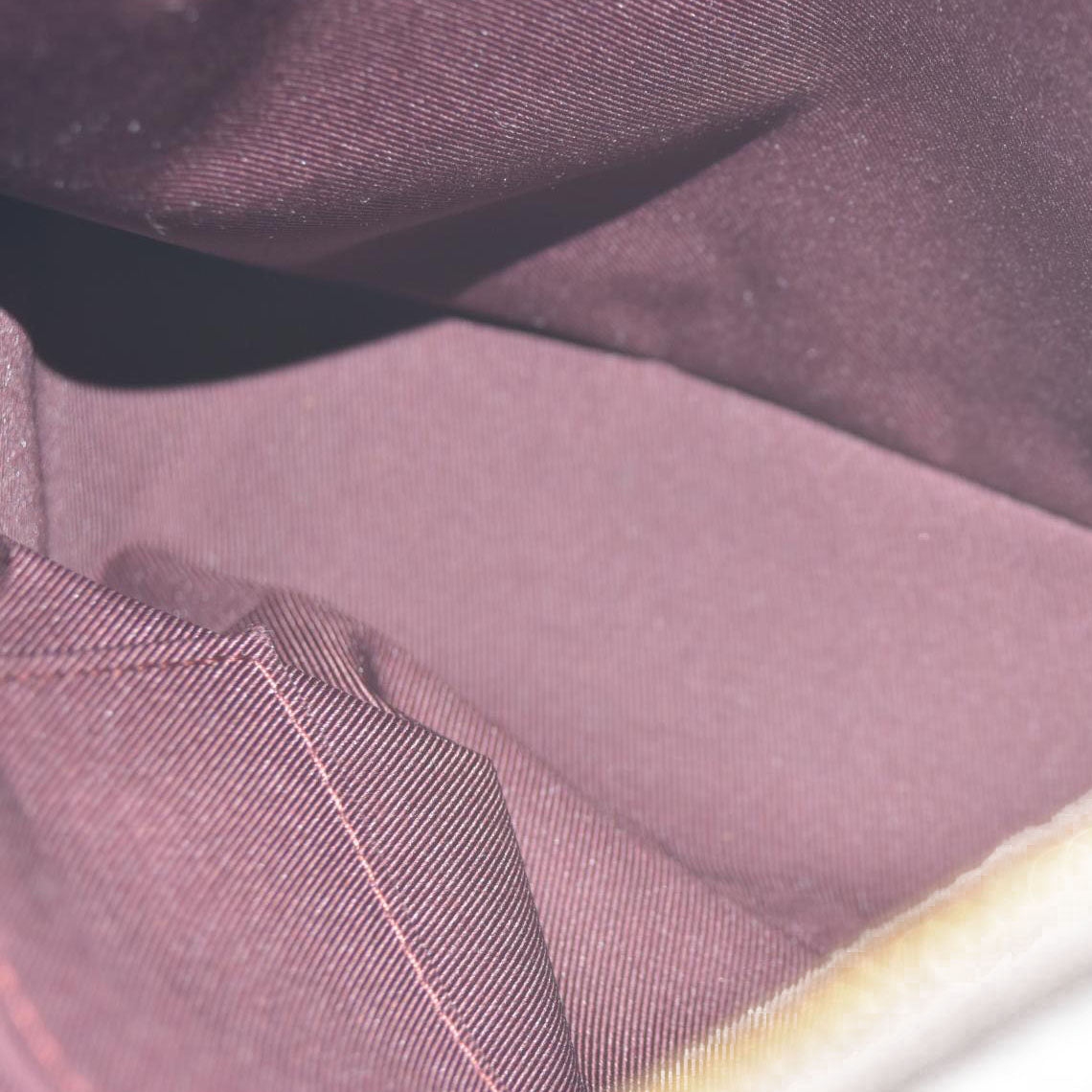 $2230  Louis Vuitton  Monogram Odeon MM Natural