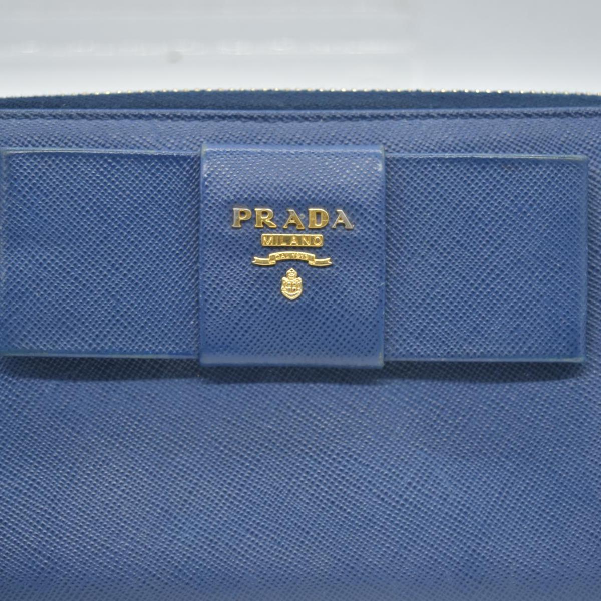 $975 PRADA Saffiano Bow Wallet Blue Zip Around Wallet CONSIGNMENT