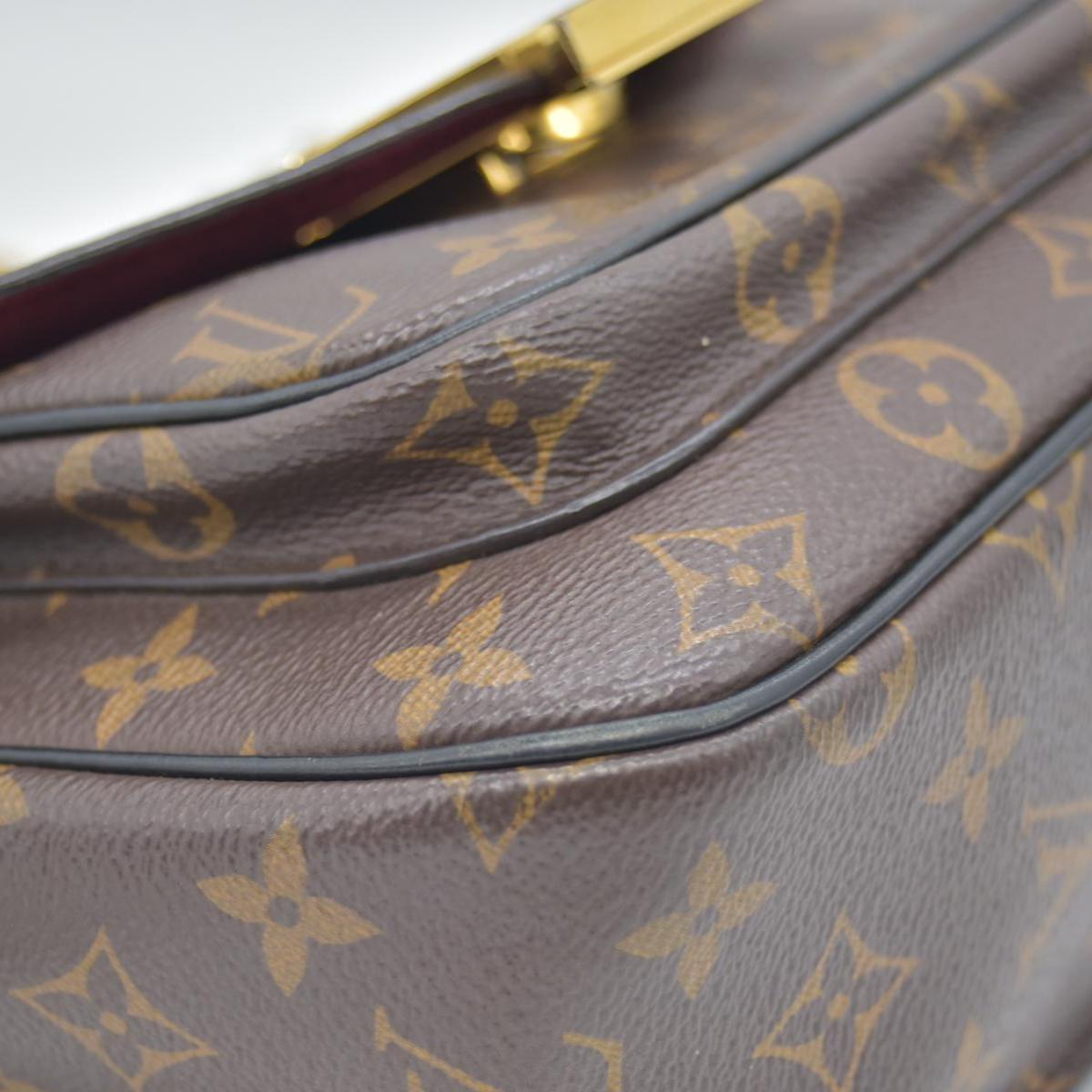 $2570 Louis Vuitton Monogram Passy
