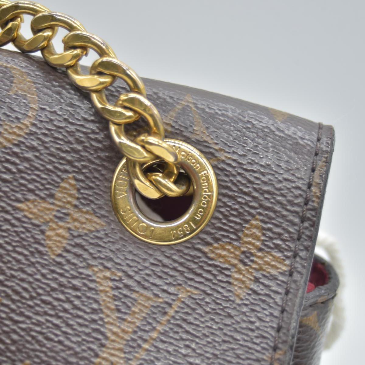$2570 Louis Vuitton Monogram Passy