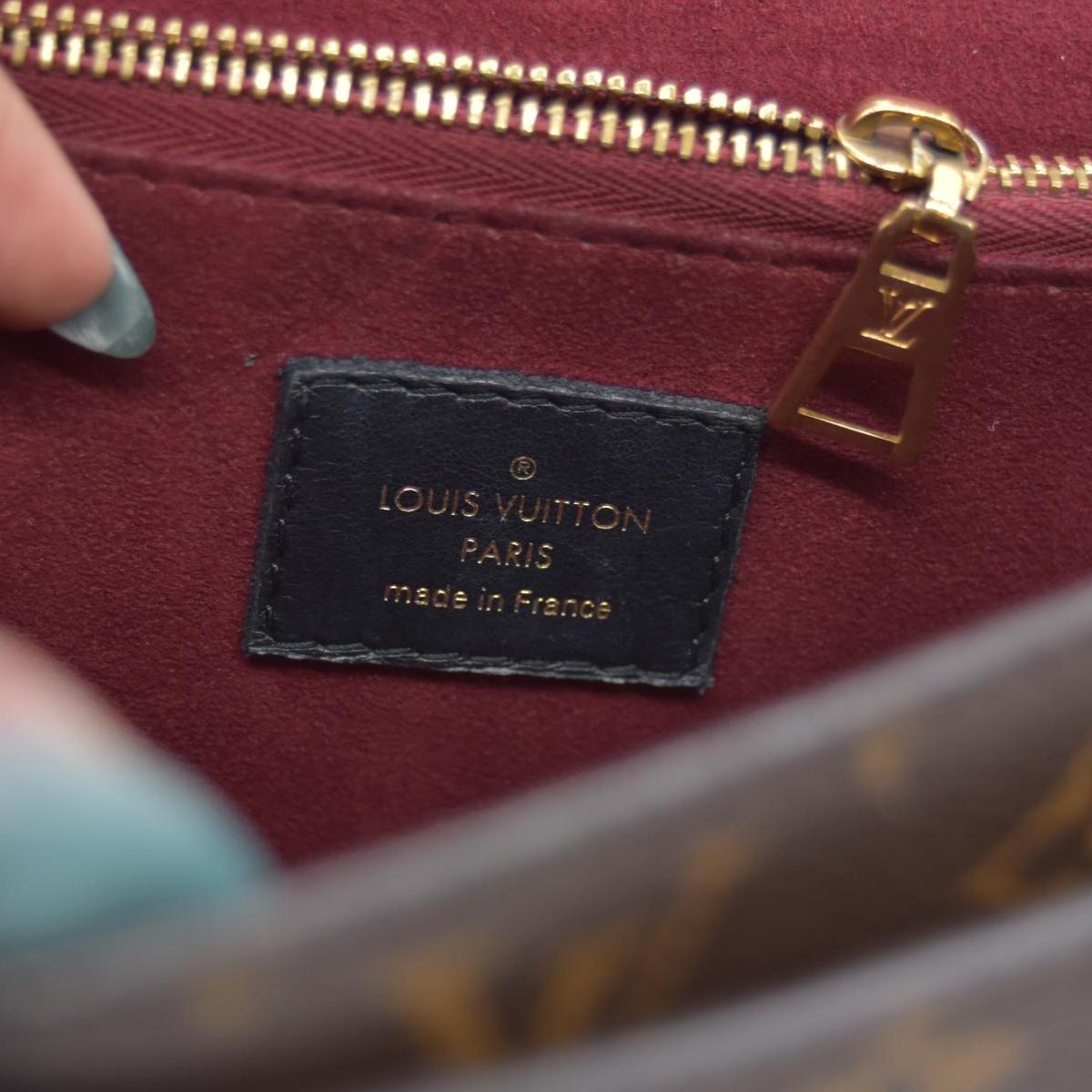 $2570 Louis Vuitton Monogram Passy