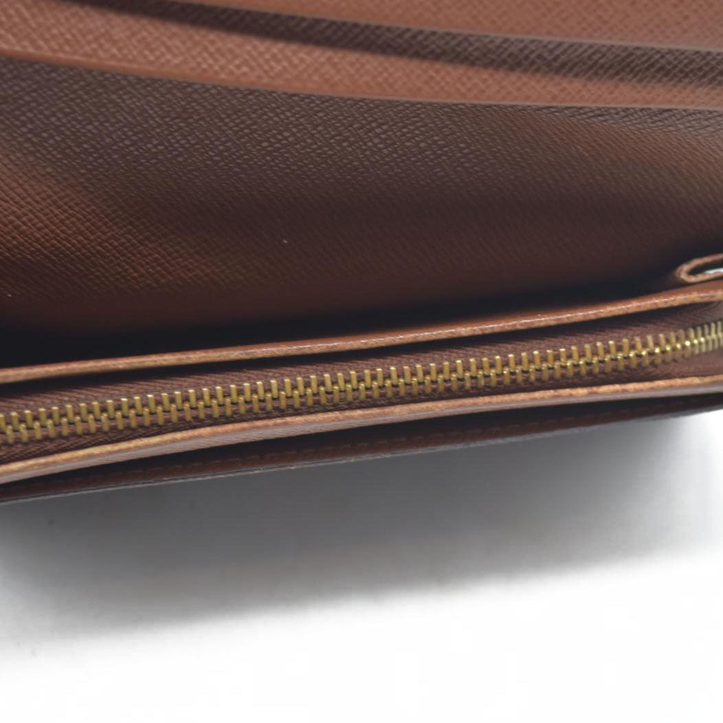 $560 Louis Vuitton  Monogram Porte-Monnaie Tresor Wallet CA0073