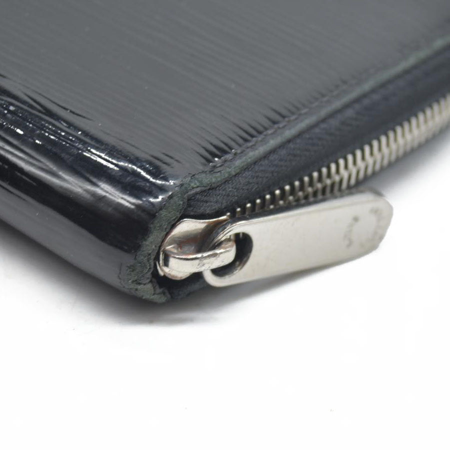$1100 Louis Vuitton  Epi Electric Zippy Wallet Black