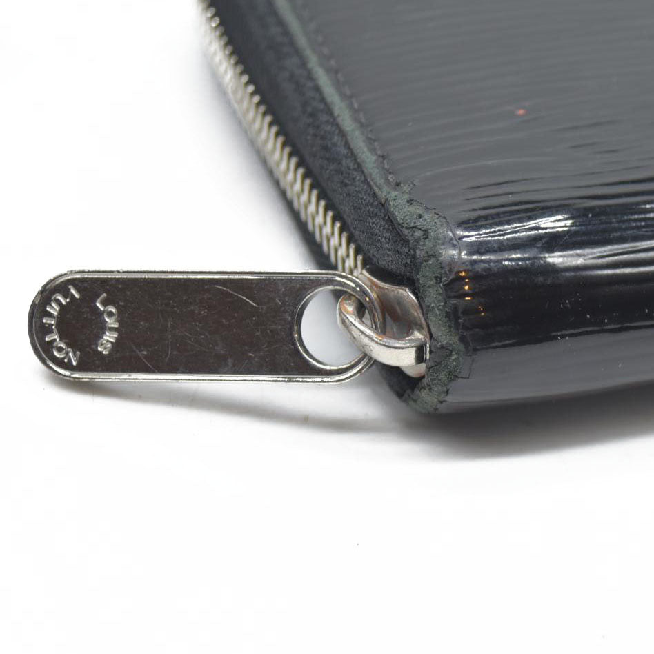 $1100 Louis Vuitton  Epi Electric Zippy Wallet Black