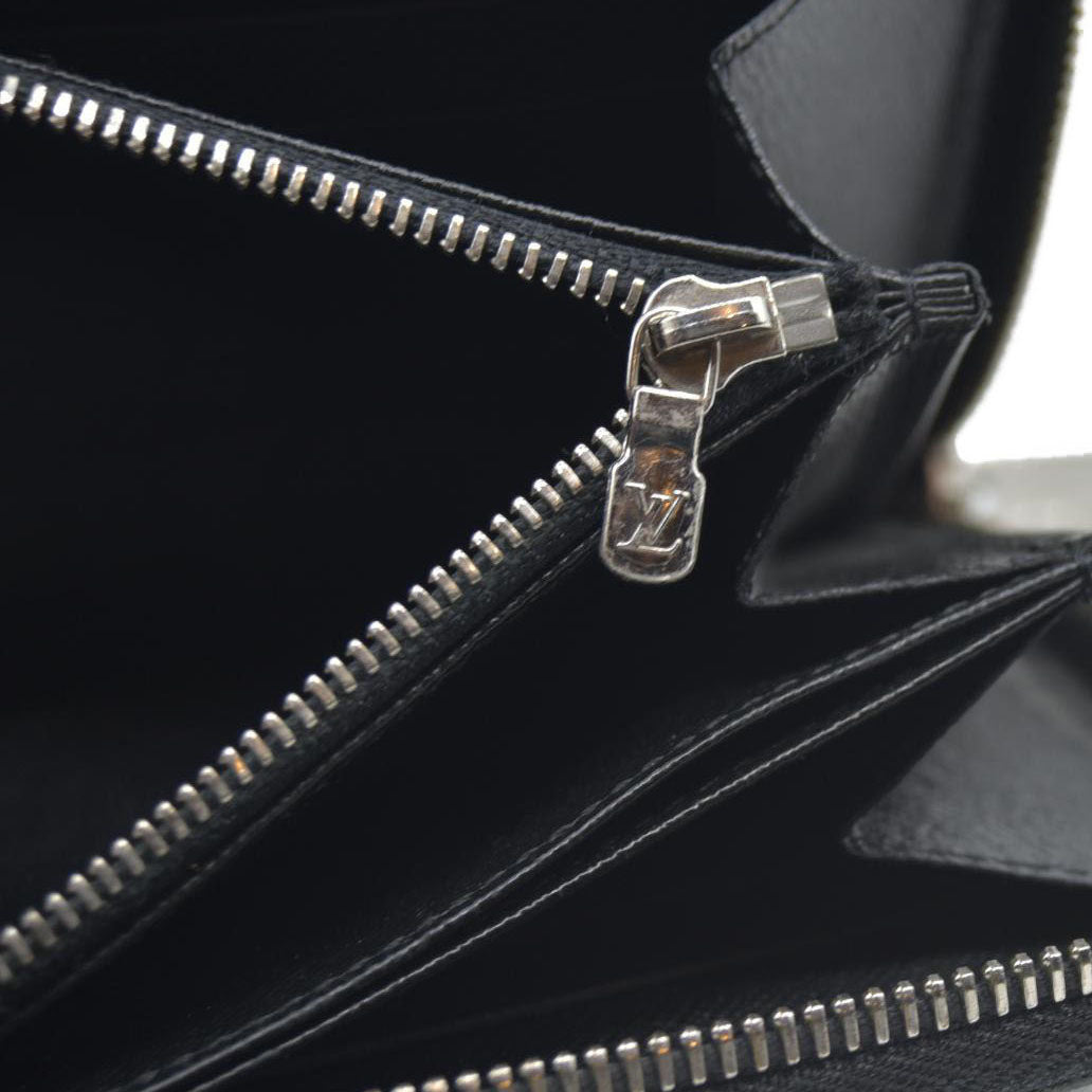 $1100 Louis Vuitton  Epi Electric Zippy Wallet Black
