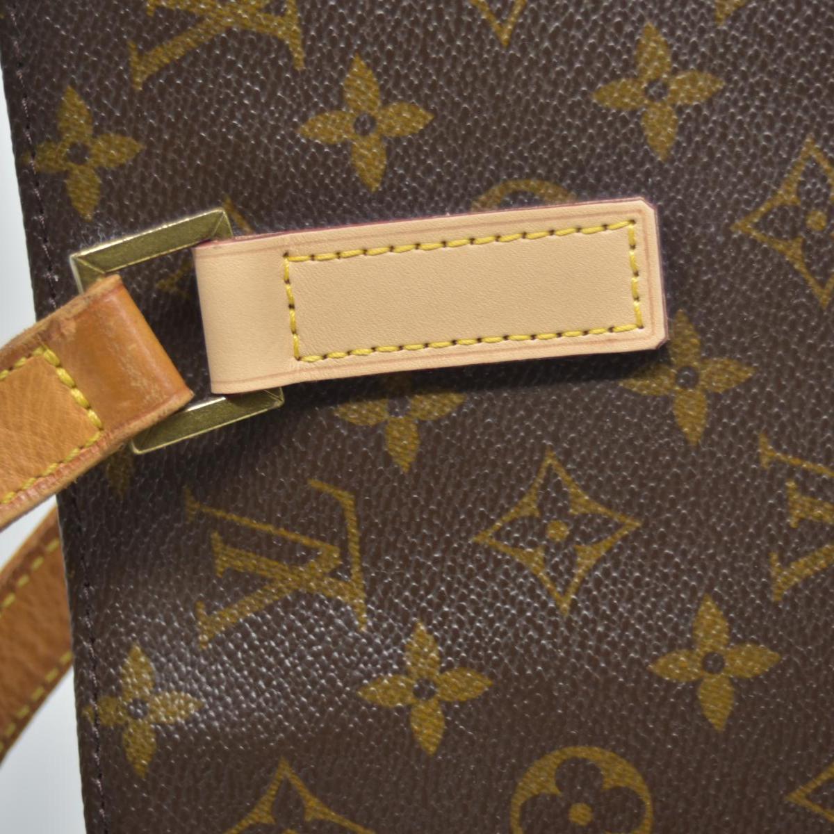 $1200 1999 LOUIS VUITTON Monogram Luco SR0959