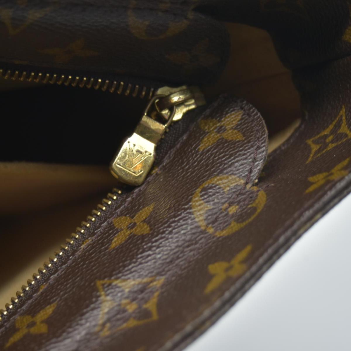 $1200 1999 LOUIS VUITTON Monogram Luco SR0959