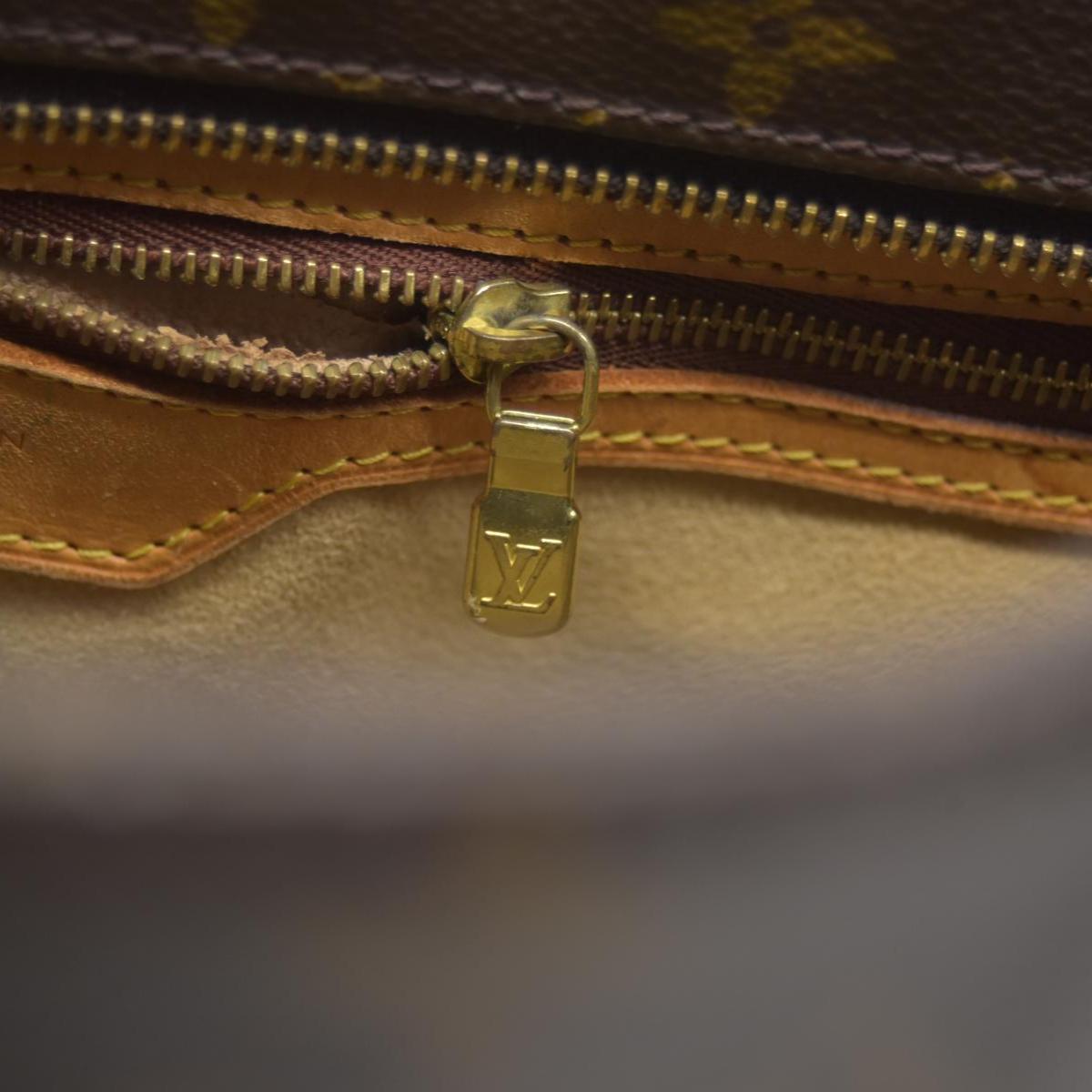 $1200 1999 LOUIS VUITTON Monogram Luco SR0959