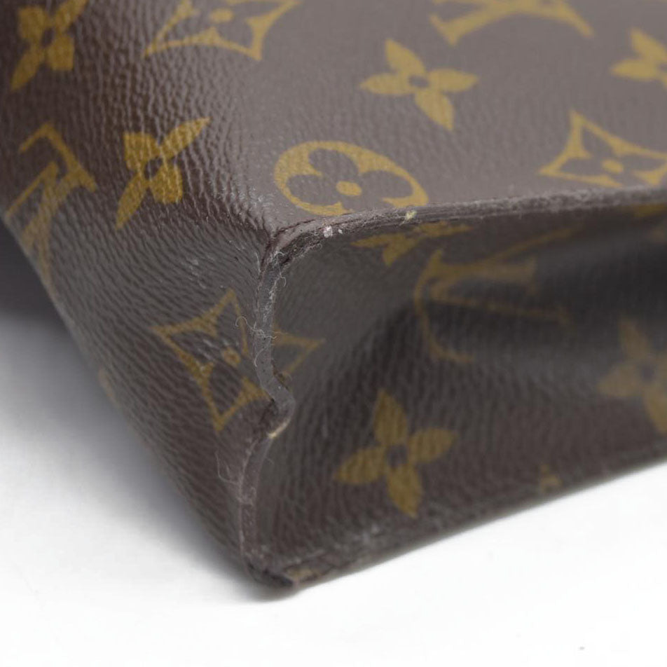 $1070 Louis Vuitton Monogram Toiletry 26