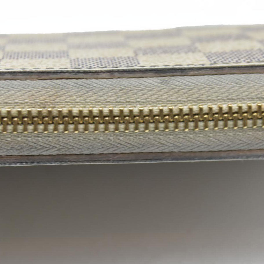 $895 Louis Vuitton  Damier Azur Zippy Wallet SD3196