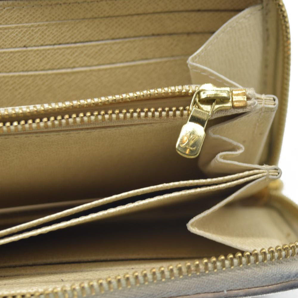 $895 Louis Vuitton  Damier Azur Zippy Wallet SD3196