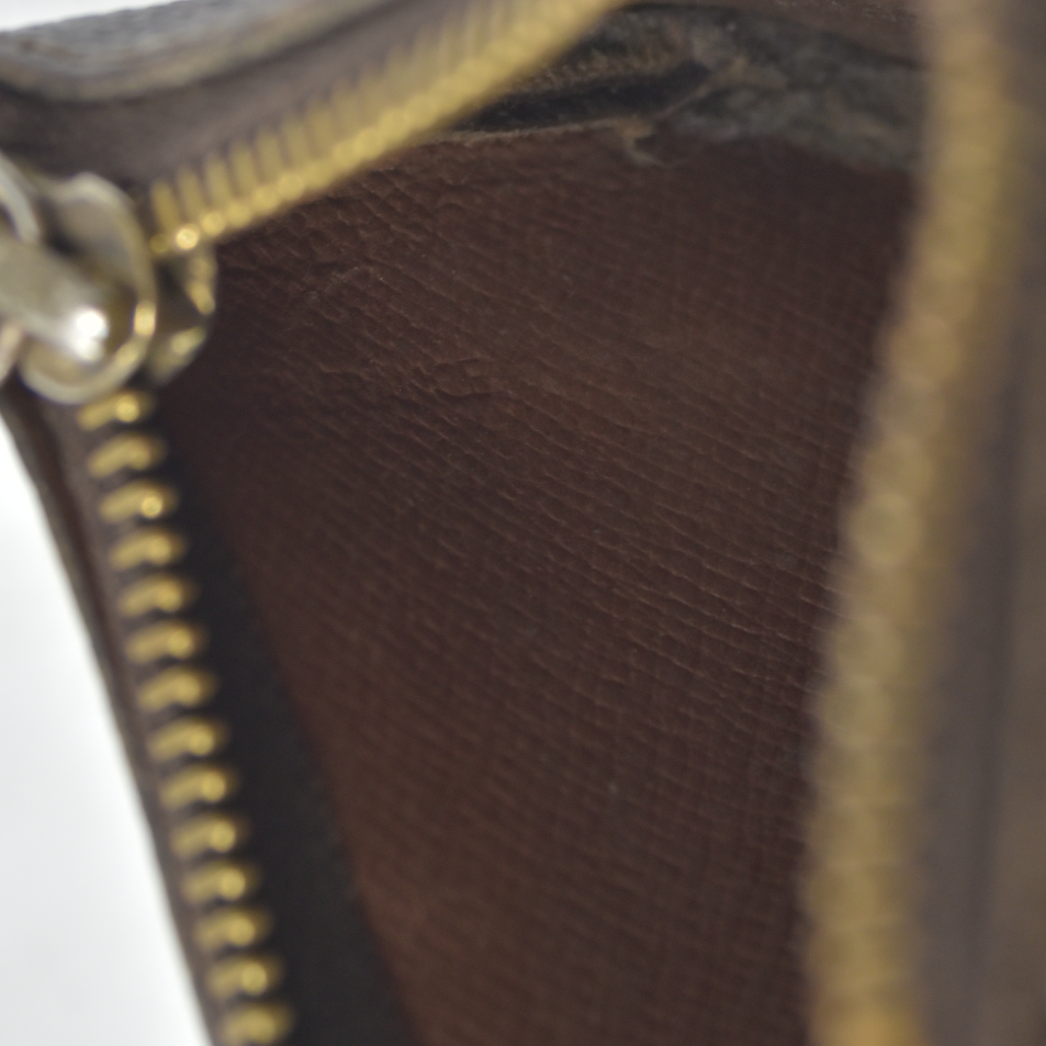 $345  Louis Vuitton  Monogram Key Pouch ET